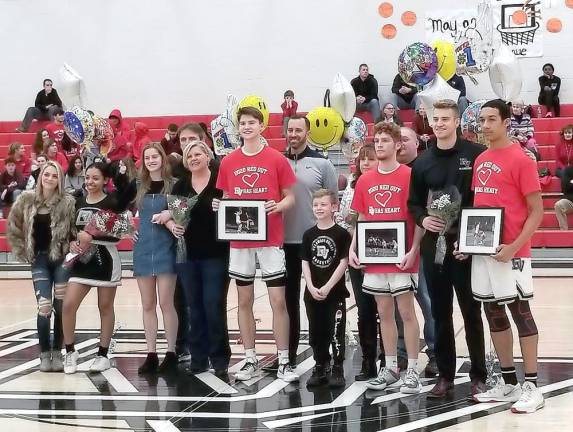 Senior Night honors: basketball players and cheerleader Alyssa Petrillo