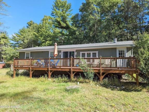 Light-filled and updated ranch on quiet country road