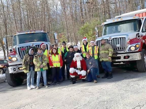 Santa on his visit to Delaware Township last year. This year, the Firefighting Elves are keeping the traditional going with a twist (Delaware Township Volunteer Fire Company Facebook page)