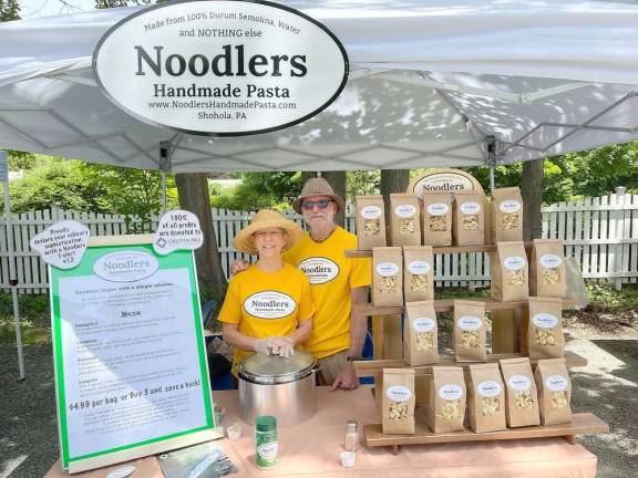 David and Zoe Greenbaum at their Noodlers Handmade Pasta stand at the Milford Farmers Market