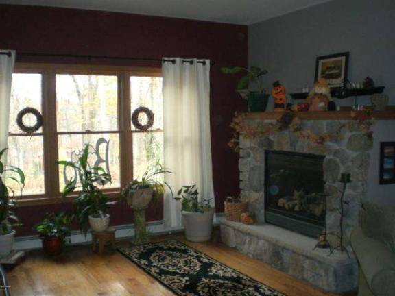 Four-bedroom farmhouse on quiet country road Four-bedroom farmhouse on quiet country road