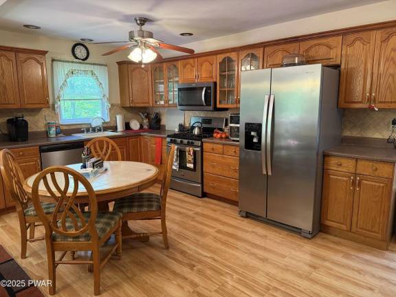 Bi-level home on a two-acre corner lot with low taxes Bi-level home on a two-acre corner lot with low taxes
