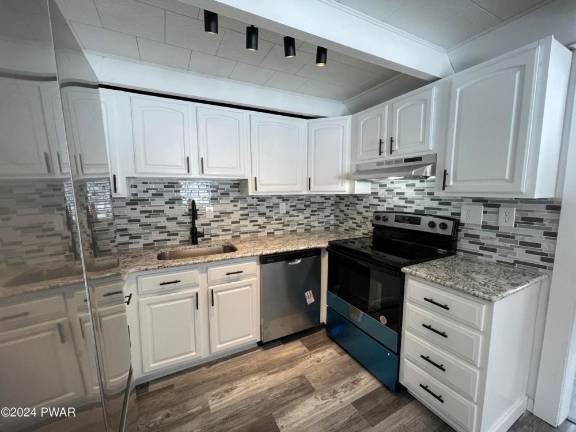 Updated home is move-in ready with lake access Updated home is move-in ready with lake access