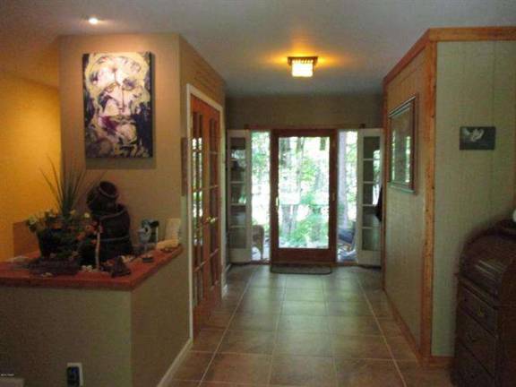 Walk to lake from distinctive four-bedroom home Walk to lake from distinctive four-bedroom home