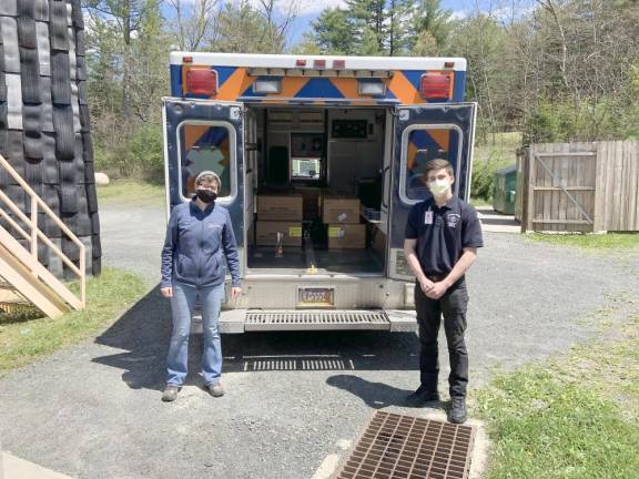 From left: Erin Taylor from the Pocono Environmental Education Center (PEEC) and Rory Naturale, a Delaware Township Volunteer Ambulance Corps volunteer (Photo provided by PEEC)