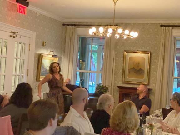 Emily Margevich singing at the post- Opera dinner at the Fauchere for opera sponsors