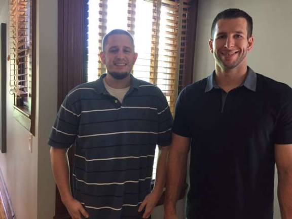 Ryan Scott (left) and Joe Fischer, owners of the Log Tavern Brewing Company (Photo by Marilyn Rosenthal)