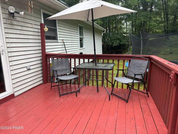 Enjoy comfort and relaxation on 1+ acres in a natural setting Enjoy comfort and relaxation on 1+ acres in a natural setting