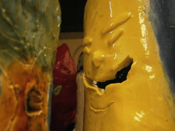 From a lump of clay come many stories Smiling clay vase