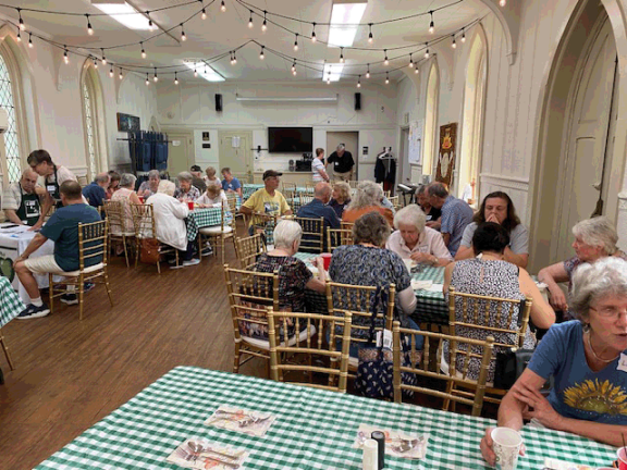 More than 45 guests from the community gathered for a bite to eat, fellowship and conversation at the resumption of the community lunch at Good Shepherd Episcopal Church in Milford on July 20.