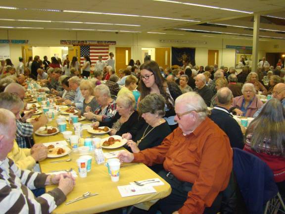 'Aladdin Jr.' dinner-theater delights senior citizens Alyssa Freymuth serves dinner guests (Photo provided)
