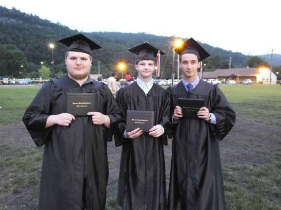 From left: Logan Alberding, Aidan Stone, and Matthew Feeney with their diplomas