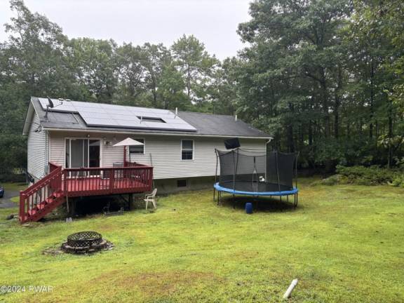 Enjoy comfort and relaxation on 1+ acres in a natural setting Enjoy comfort and relaxation on 1+ acres in a natural setting