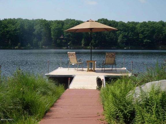 On the lake, with private dock On the lake, with private dock