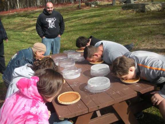 Pumpkin pie eating contest. Pies donated by Weis.