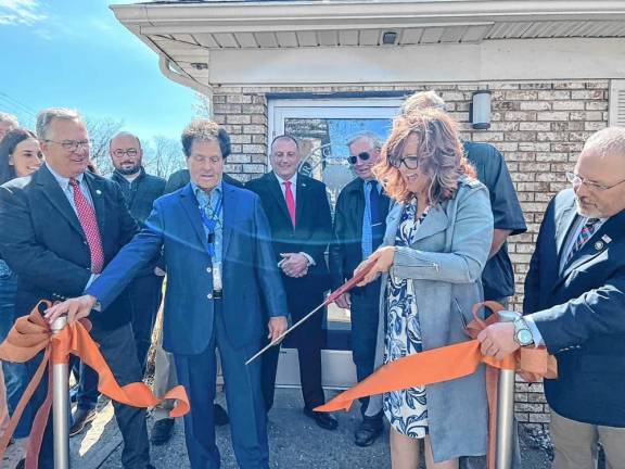 Orange County Clerk Kelly Eskew cuts the ribbon on Port Jervis’s new DMV.