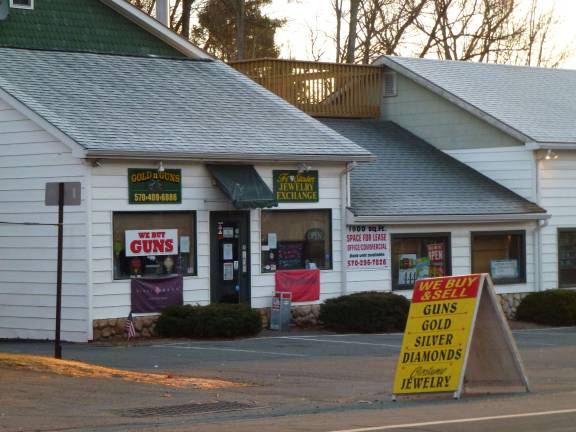 After shooting, a rush to buy guns Guns-n-Gold shop in Milford