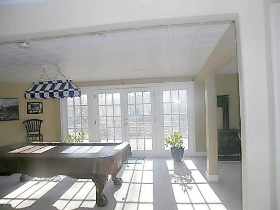 Five-bedroom colonial has luxury, charm, and lavish space Lower view to patio