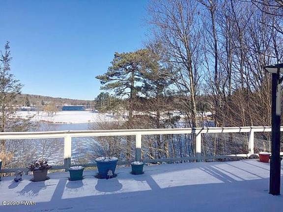 Custom three-bedroom contemporary lakefront with private dock View