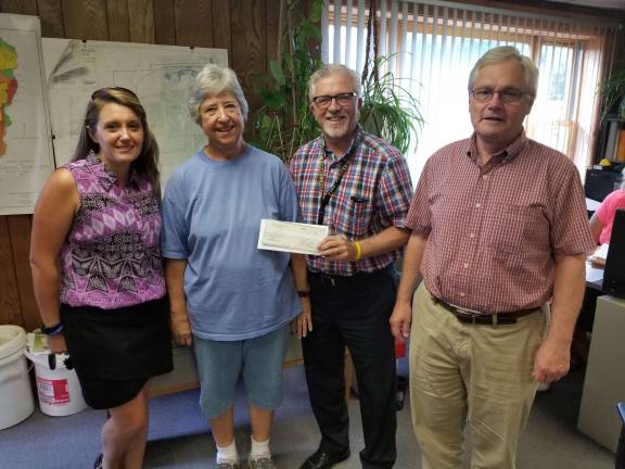 United Way donates $1,500 to Pike Food Pantry From left: Jody Welsh, executive director of United Way of Pike County; Pike County Food Pantry volunteer; Matt Osterberg, United Way of Pike County President and Pike County Commissioner, and Steve Gucinni, Pike County Commissioner (Photo provided)