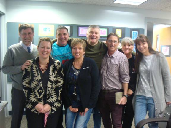 'Learn another language,' urges former teacher Kevin Smith reunites with former colleagues, in back (from left): Dr. Mike Vitale, Mr. Brian McCarthy, Mr. Eddie Murphy, Mr. Kevin Smith, Mrs. Arlene Bara and Mrs. Geri McKinney. Front: Mrs. Laurie Yatsonsky and Mrs. Lora Castoro (Photo provided)
