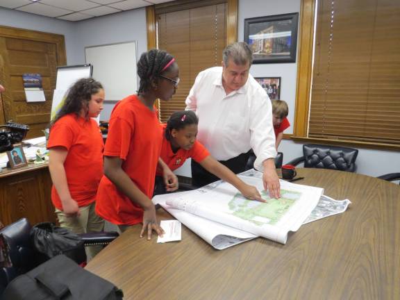 Mayor DeStefano shows DVE-News/TV reporters the plans of the new bike routes in Middletown, N.Y.