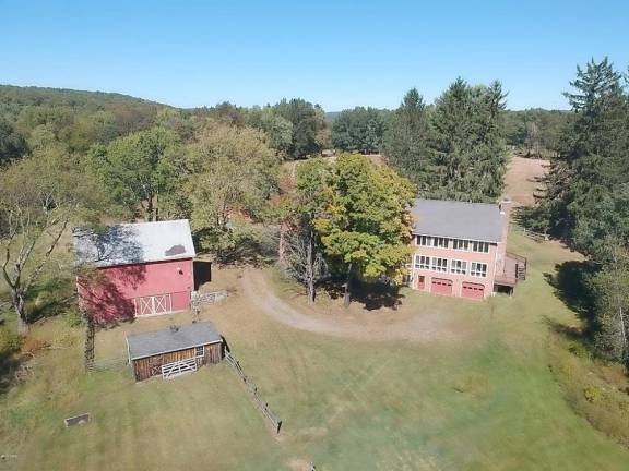 Mountaintop equestrian estate includes modern home and pond Property overview