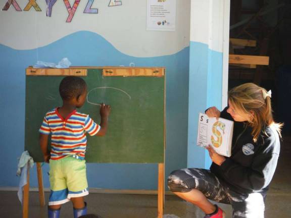 Lending a loving hand in South Africa Teaching literacy skills was a major focus for Mount student Mary Bocskocsky during her recent humanitarian trip to South Africa’s Cape Town (Photo provided)
