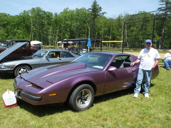 The cars are the stars at 'Cruise in the Park' Tim McDowall of Dingmans Ferry poses next to his sleek 1985 Pontiac Firebird