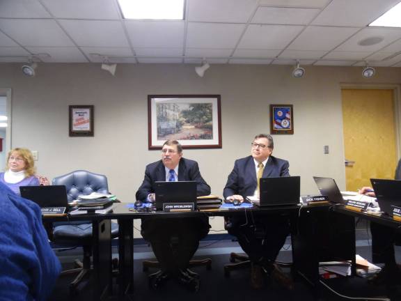Pay now or pay more later on school barn, superintendent says President Pam Lutfy, board member John Wroblewski, and financeChair Jack Fisher (pictured left to right) expressed doubts about driving up construction costs (Photo by Anya Tikka)