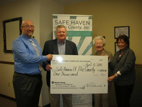 Greater Pike announces mini-grants awards Photo provided Pictured from left: David Bever, Executive Director Safe Haven; James Pedranti, President, Greater Pike Community Foundation Board; Barbara Buchanan, Greater Pike Community Foundation Board Member; and Karen Kontizas, President, Safe Haven Board.