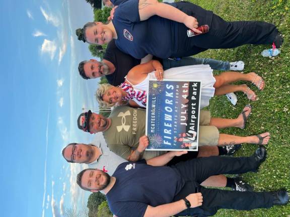 Left to right- Paramedic Kyle Wright, Carl Will, Councilman John Maney, Lisa McAteer, Alex McAteer. EMT Megan Irwin