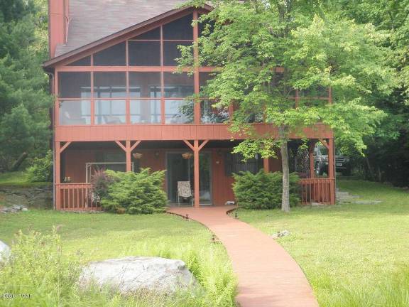 On the lake, with private dock On the lake, with private dock