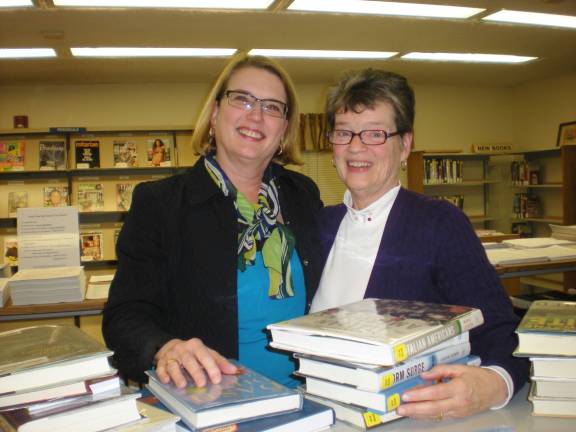 Booklovers Bash to raise money for Hawley Library Pictured making plans for the event are Library Board President Margot Adams Clauss (left) and Booklovers’ Chair Dona Schmalzle (Photo provided)