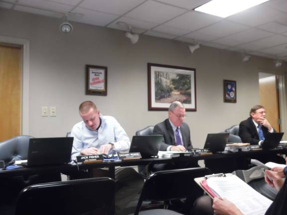 School board tackles policy, school construction From left: President Zachary Pearce, Superintendent John Bell, and board memberJohn Wroblewski (Photo by Anya Tikka)