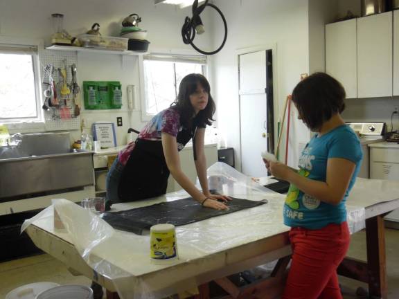 Locals get crafty Fiber Artist Fellow Joanna Hickman 'wet felting' or making felt.