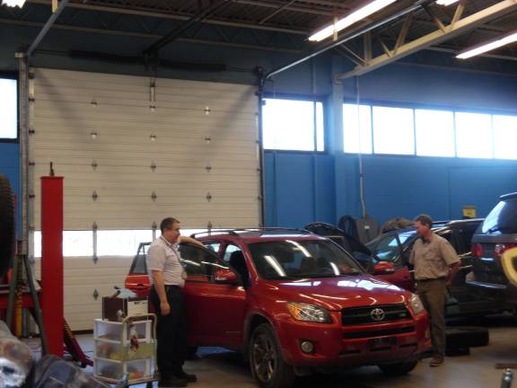 Putting education to work Inside the automotive shop (Photo by Anya Tikka)