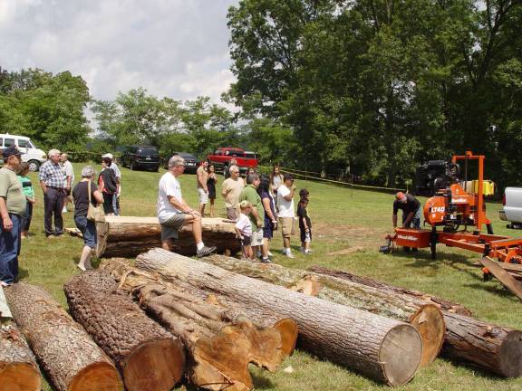 Festival of Wood to celebrate 10 years Photos credit, Grey Towers Heritage Association A portable sawmill demonstrates how logs become lumber.