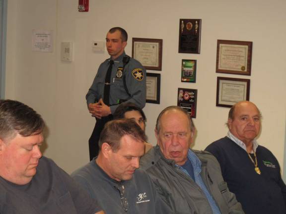 Lake Adventure says code changes are retaliation for court victory Lake Adventure owners and Sheriff's Deputy standing guard in case of any trouble (Photo by Jerry Goldberg)