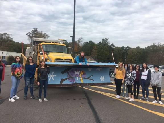 Paint the plow — but don't crowd it! Student-artists from Wallenpaupack High School decorated their own plow, with a rather chilled-looking chameleon holding a "Go Buckhorns!" sign. (Photo provided)
