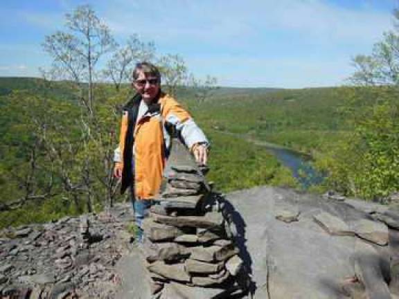 Park Ranger led nature hike of the Bouchoux Trail Photo provided Hiker poses at the top of the Bouchoux Trail.