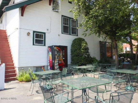 Two-story building with apartment and successful business Two-story building with apartment and successful business