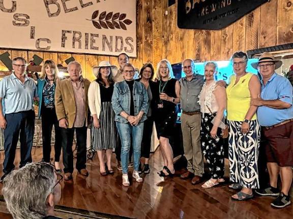 Rotary supports the Center for Developmental Disabilities L-R: members Doug Luhrs, Kelly Gaughan, Allan Schatz, Candace Mahala, Shaun Burger, Monica Schatz, Penny Luhrs, Karen Loeschorn, John Messer, Christine Kerstetter, Arlene Quirk, and Dean Quirk.