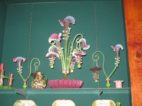 Vaseline glass is a little-known treasure Antique Vaseline glass in Martin's private collection in some of his blacklighted display cases