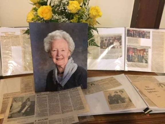 Two tables were filled with memorabilia and clippings documenting Barbara Buchanan's life of service to others (Photo by Marilyn Rosenthal)