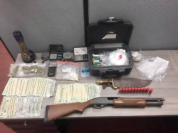 Three arrested after drug raid Three arrested after drug raid