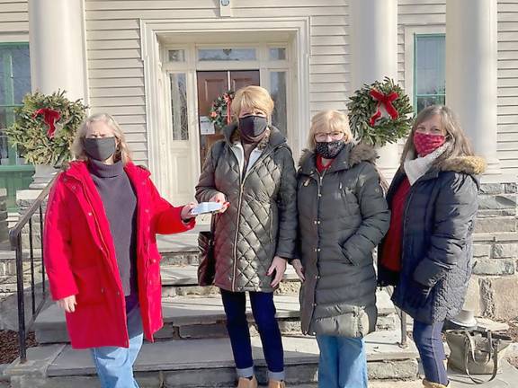 Emer Day, DVA! board member (left), presents a check to Pat Hendershot and Ellen Orben, co-treasurers and co-chairs of the Milford Garden Club’s Scholarship Committee, and Liz Steen, President of the Milford Garden Club. (Photo provided)