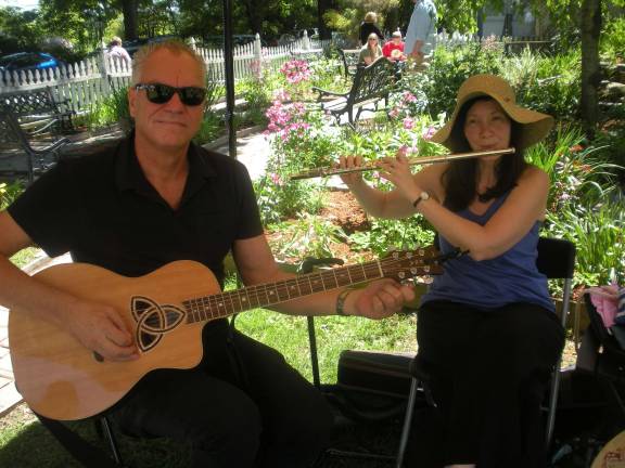 Fresh, local goods a plenty Alastair Gordon plays guitar & Maryanne MacMahon-Ford plays flute.