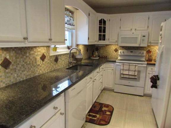 Upgraded four-bedroom contemporary Upgraded four-bedroom contemporary