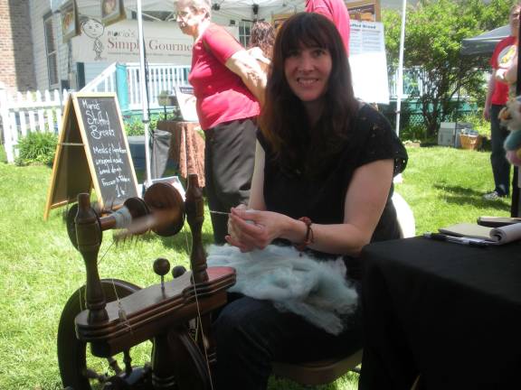 Fresh, local goods a plenty Natalie Burger spins Alpaca into yarn Hidden Pastures, Branchville, N.J.